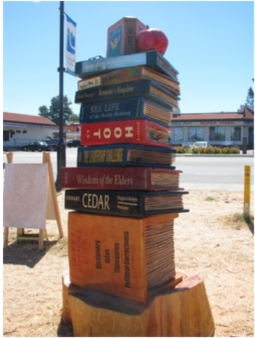 carving of stack of books
