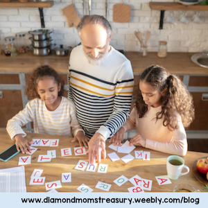 father doing word game with daughters