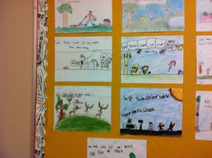 Close up of bulletin board display with pictures of ways to take care of our world.