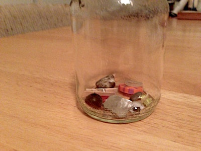 jar with small items in it