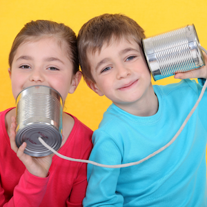 kids using tin can telephones