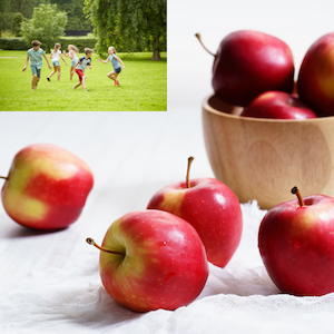 apples and children running in a field