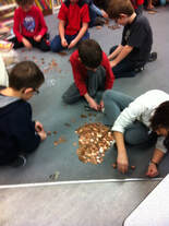 Counting money for Pennies For Presents