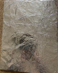 cardboard covered with tinfoil