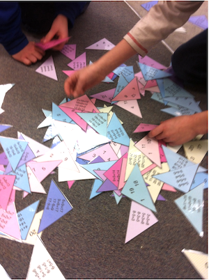kids working with fact family triangles