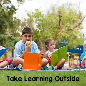 Take learning outside. Kids reading outside.