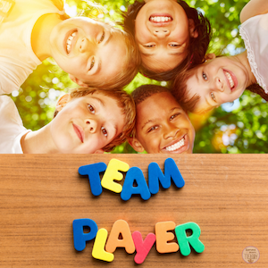 Team player. Kids heads in a circle smiling.